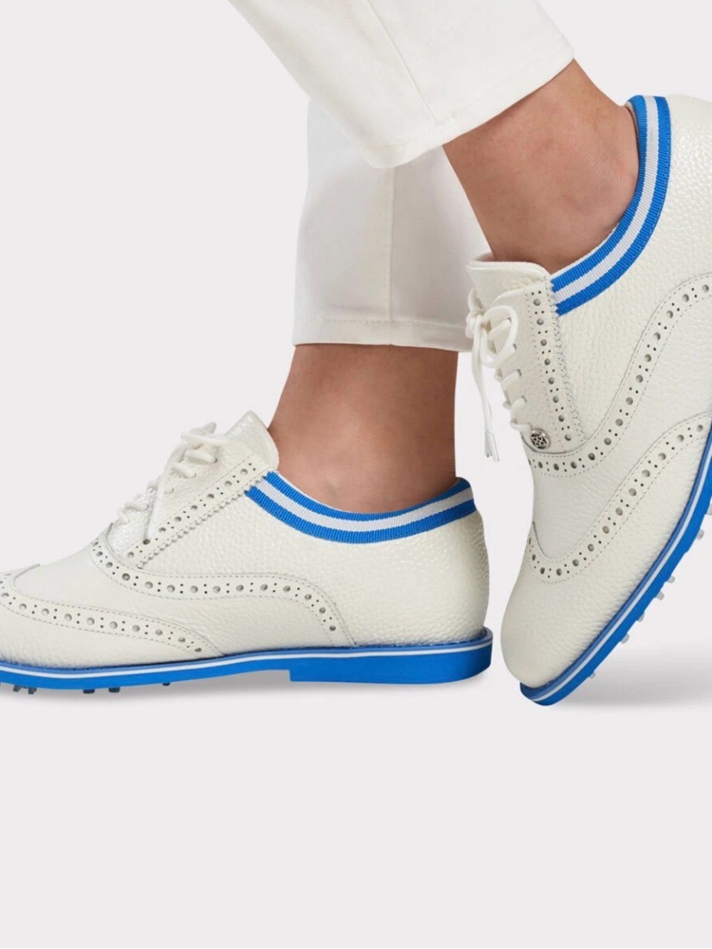 G/FORE White Leather Wingtip Golf Sneaker with Blue Trim